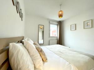 Appartements Le Central - Confort et Calme au centre-ville - Lits Queen Size : photos des chambres