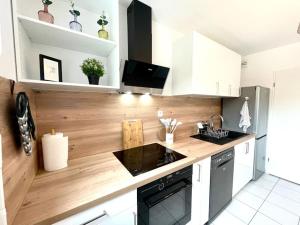 Appartements Le Central - Confort et Calme au centre-ville - Lits Queen Size : photos des chambres