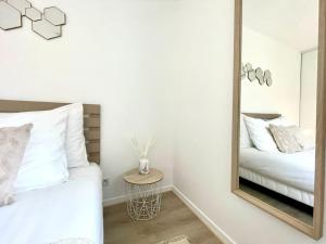 Appartements Le Central - Confort et Calme au centre-ville - Lits Queen Size : photos des chambres