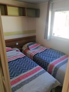 Campings MOBIL HOME 2 Chambres Dans Camping a 2 pas du lac de Biscarrosse : photos des chambres