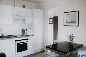 Appartements Front de Mer - Villa Mozart : photos des chambres