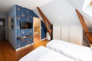 Hotels Le Gingko - Hotel du Golf Parc Robert Hersant : photos des chambres