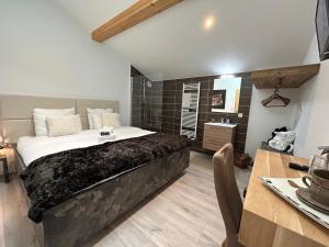 Appartements Les Trois Chaufatons - Chalets Boutiques, Proprietes Mont Amour : photos des chambres