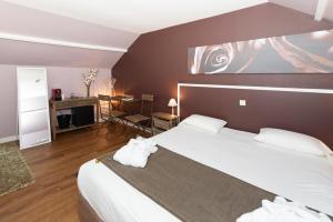 Hotels Le Gingko - Hotel du Golf Parc Robert Hersant : photos des chambres