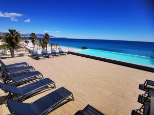 Appartements Pearl Beach - Rooftop Pool Seaside : photos des chambres
