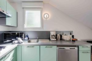 Appartements L’appart Lodge 106 : photos des chambres