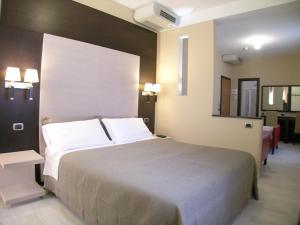 Quadruple Room with Balcony room in Albergo La Marina