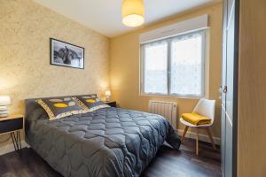 Appartements Entre Terre et Mer - Appt pour 4 : photos des chambres