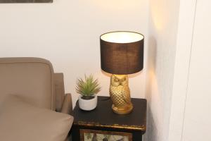 Appartements Studio meuble en face du golf cote piscine : photos des chambres