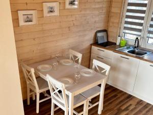 Comfortable holiday houses near the sea, Rewal