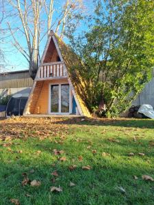 Chalets Le Chalet Tipi avec jacuzzi et jardin : photos des chambres