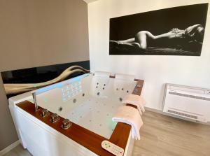 Appartements La Vague Tendresse - Vue mer - Jacuzzi & Sauna : photos des chambres