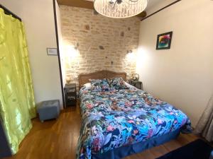 B&B / Chambres d'hotes O Clair de Lune Chambres d'hotes climatisees a Sarlat - parking prive - piscine chauffee - espace bien-etre Jacuzzi et massages : photos des chambres