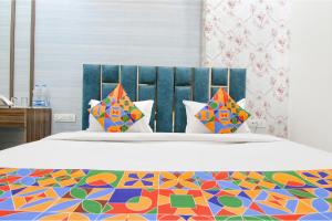 FabHotel Yellow Leaf