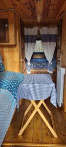 Campings Roulotte la bleuet avec piscine : photos des chambres