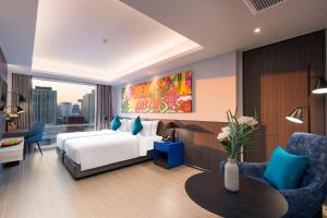 Phòng Hai Giường Đơn Loại Sang Grand Hướng Thành Phố (Grand Deluxe City View Twin Room)