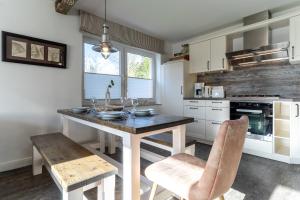 Frahmshus Ferienhaus Kapitäns Kajüte