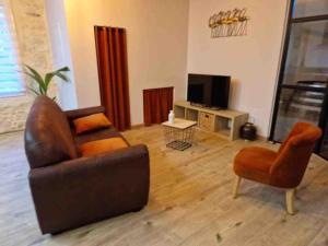 Appartements Gite « domaine de l’oustal nau » : photos des chambres