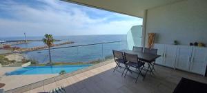Appartements NEPITA- Vue mer- piscine en residence de standing- clim-Wifi : photos des chambres