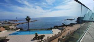 Appartements NEPITA- Vue mer- piscine en residence de standing- clim-Wifi : photos des chambres
