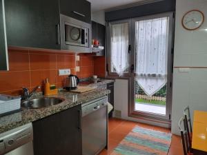 25A01 Duplex con jardín y garaje
