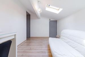 Appartements Jolie petite maison Alicia - Jardin - Cite de l'Espace : photos des chambres
