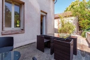 Appartements Jolie petite maison Alicia - Jardin - Cite de l'Espace : photos des chambres