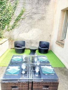 Appartements Jolie petite maison Alicia - Jardin - Cite de l'Espace : photos des chambres