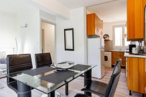 Appartements Jolie petite maison Alicia - Jardin - Cite de l'Espace : photos des chambres