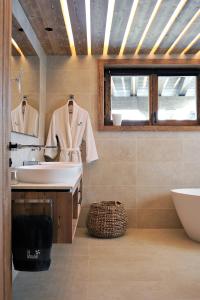 Chalets Chalet Le Moulin, Courchevel Le Praz, 6 chambres, Ski in, Ski out : photos des chambres