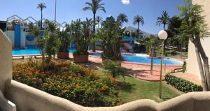 Sunny Apartment at Benal Beach Resort 4 Pools, Water Slides Steps from Beach