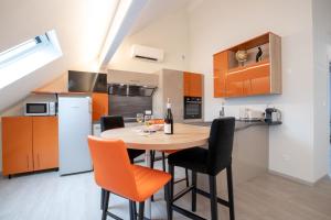Appartements La Source aux Cepages : photos des chambres