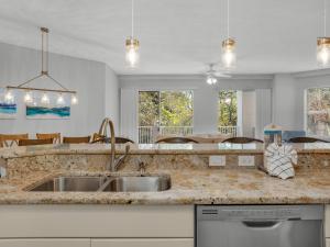 Blue Mountain Beach Condominium 102 by Newman-Dailey