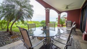 Spacious 4BR Condo with Partial Ocean View - Bougainvillea - Reserva Conchal