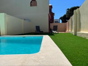 Casa piscina playa Barrosa Delfin 7