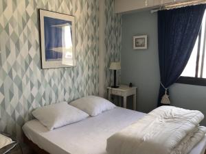 Appartement T2 refait à neuf avec balcon face mer et ascenseur, au cœur des Sables-dOlonne - FR-1-485-70