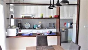 Reihenhaus am Meer mit Pool, primera linea