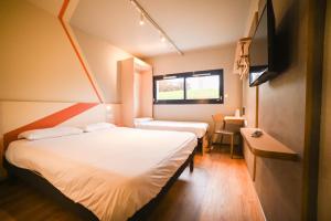 Hotels ibis budget Site du Futuroscope : photos des chambres