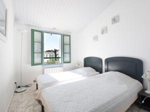 Maisons de vacances Maison La Couarde-sur-Mer, 6 pieces, 6 personnes - FR-1-258-3 : photos des chambres