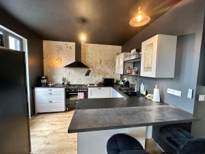 Appartements L'echoppe Bergeracoise, Salle de jeux, Climatisation et terrasse : photos des chambres