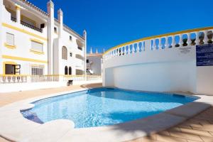 Sunny Duplex W Pool & Balcony by LovelyStay