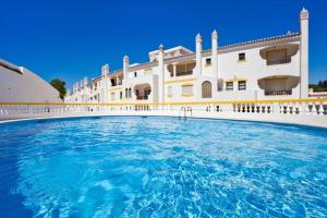 Sunny Duplex W Pool & Balcony by LovelyStay