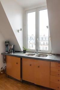 Appartements 120 m with terrace - in the heart of the Marais : photos des chambres