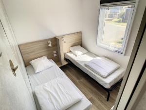 Maisons de vacances Mobil-Home Jullouville, 4 pieces, 6 personnes - FR-1-361A-58 : photos des chambres