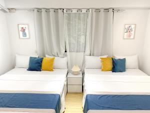 Fully Furnished 2BR Newly Renovated Apartment by the White Beach - 1min walk from door step