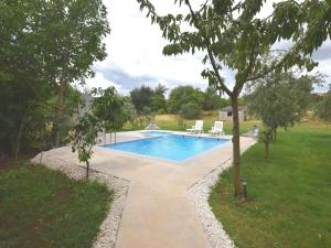 Apartment in holiday home with pool spacious garden with grill airco and wifi