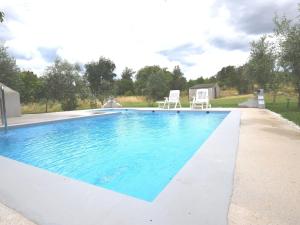 Apartment in holiday home with pool spacious garden with grill airco and wifi