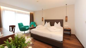 Standard Double Room with Balcony room in Hotel Vier Jahreszeiten