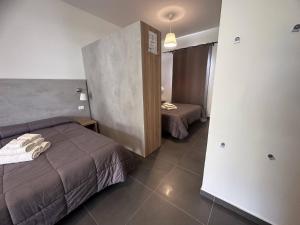 Family Room with Garden View room in Frontemare Camping Village