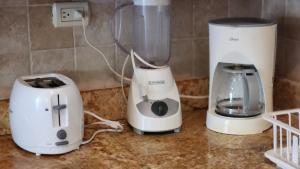 Cozy Garden Oasis Steps to the Beach